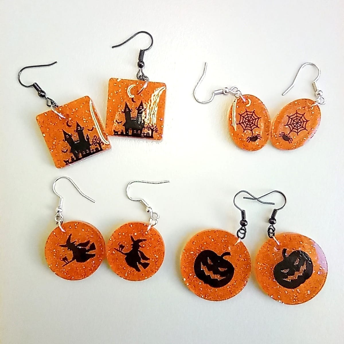 Σκουλαρίκια οβάλ Halloween spider με υγρό γυαλί