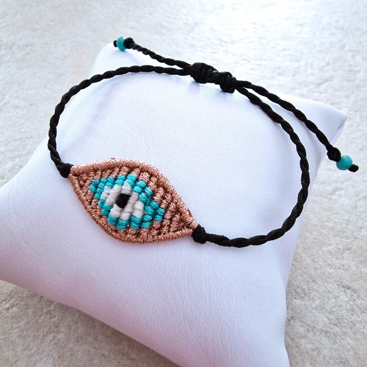 Βραχιόλι boho chic μάτι χειροποίητο μακραμέ ροζ χρυσό μεταλιζέ με κούμπωμα αυξομείωσης