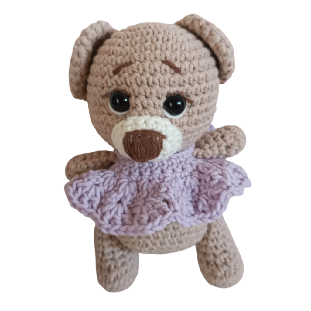 Πλεκτό αρκουδάκι με λιλά φορεματάκι (amigurumi) ύψους 14 εκ.